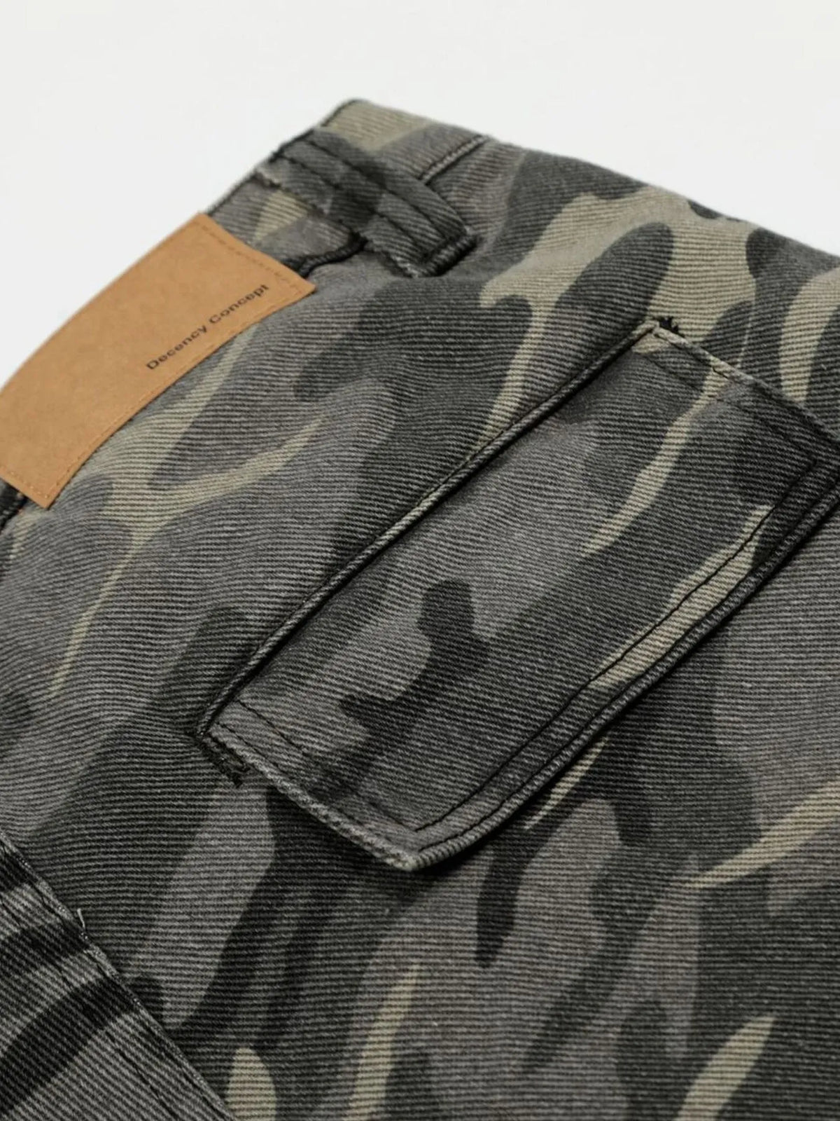 Camouflage pants with a brown patch on a white background-Black Orvani