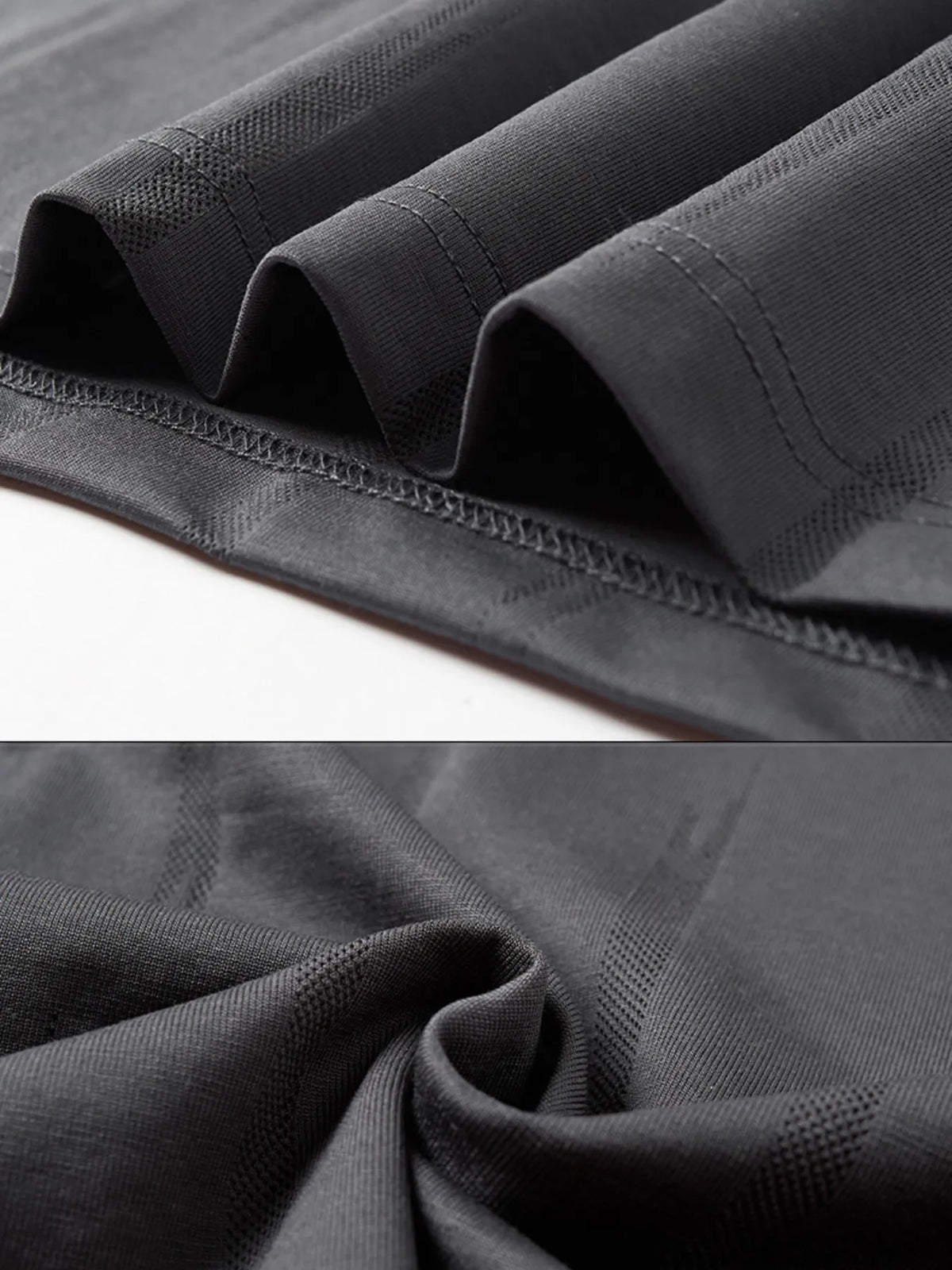 Close-up of black fabric with textured pattern on a white background-blackorvani.com