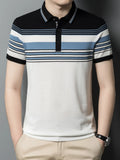 Man wearing a black, white, and blue striped polo shirt against a gray background-blackorvani.com