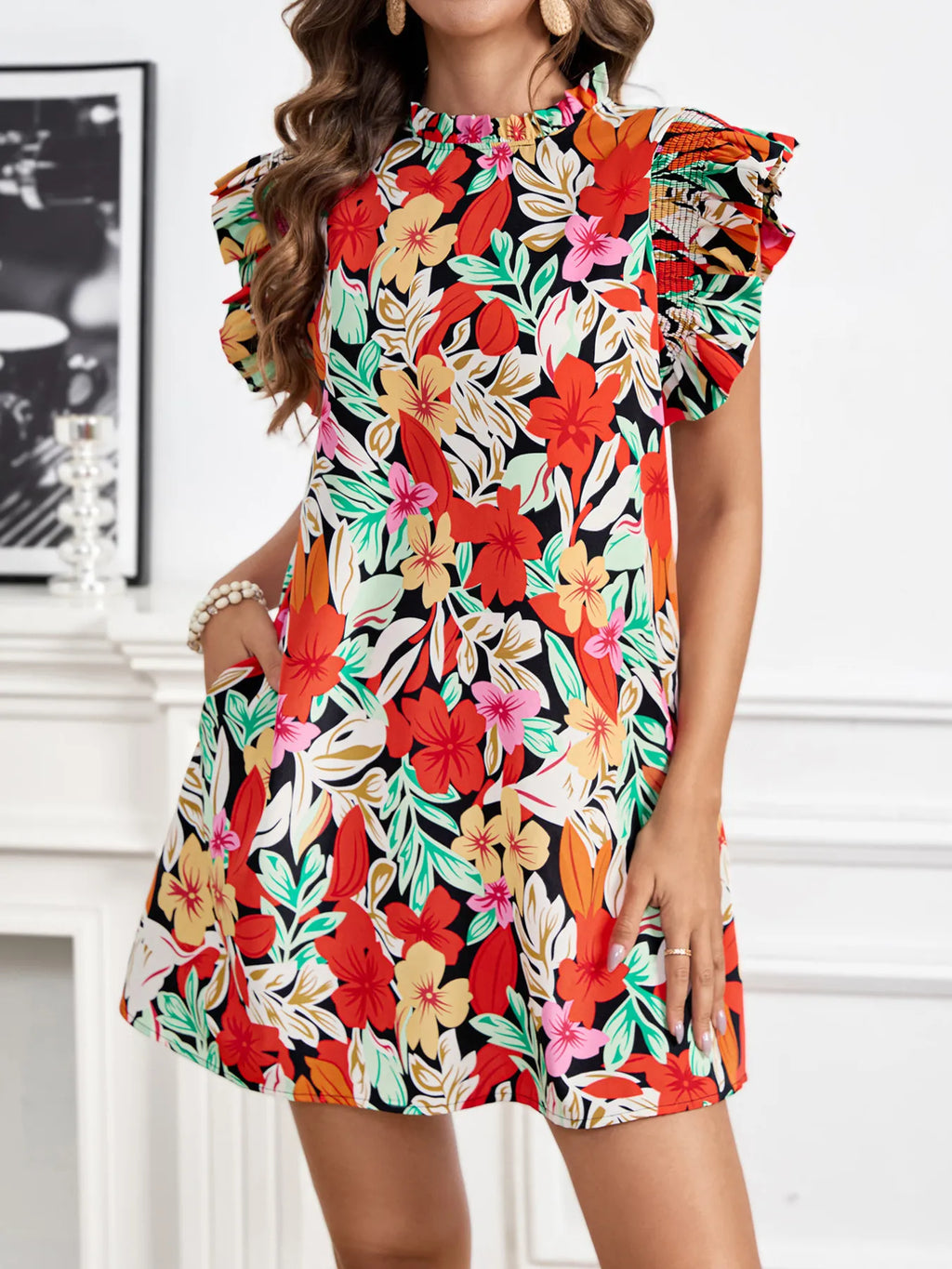Woman wearing a colorful floral dress with a white background-BlackOrvani