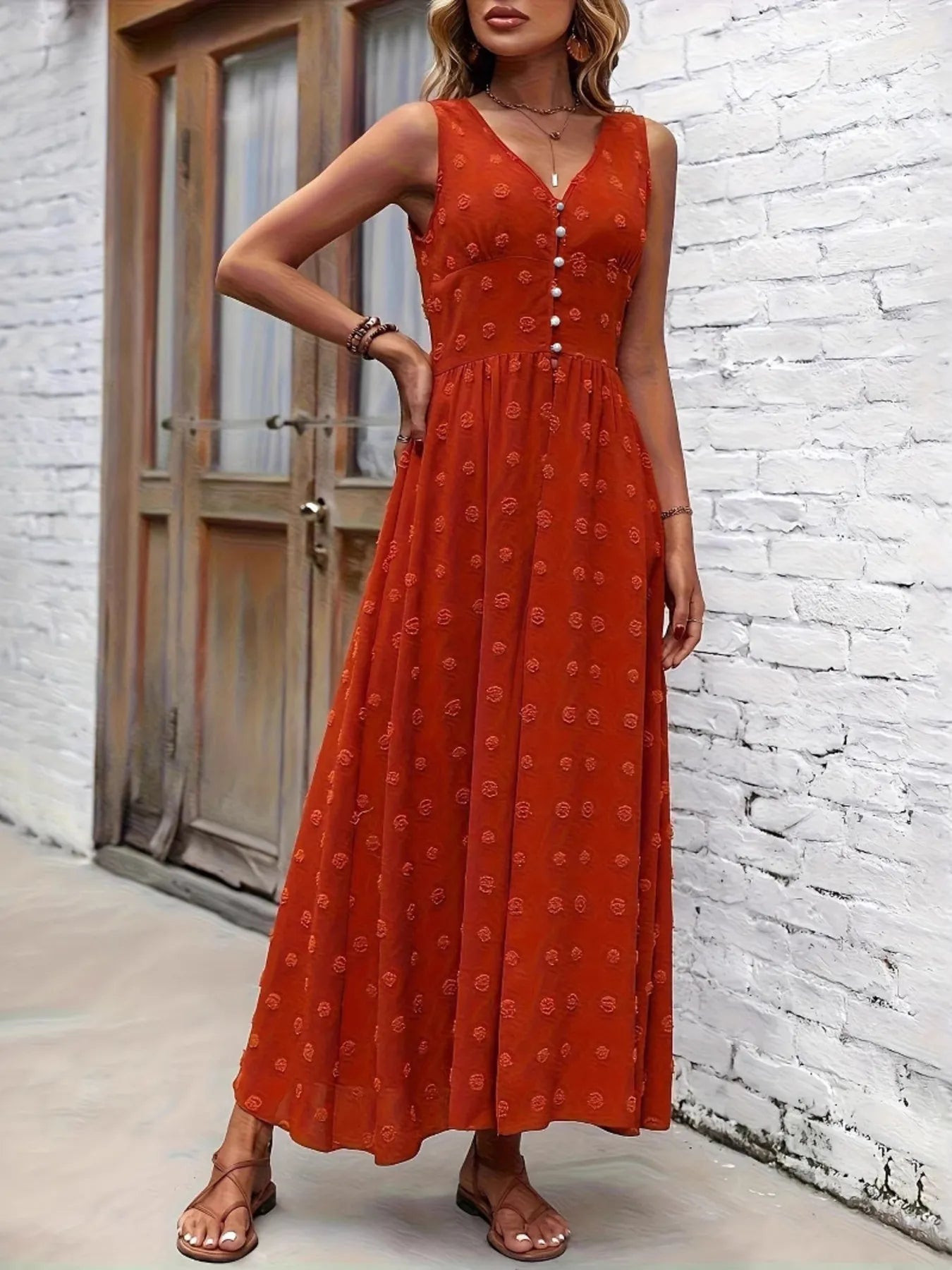 Woman wearing a red dress with a white brick wall background-BlackOrvani