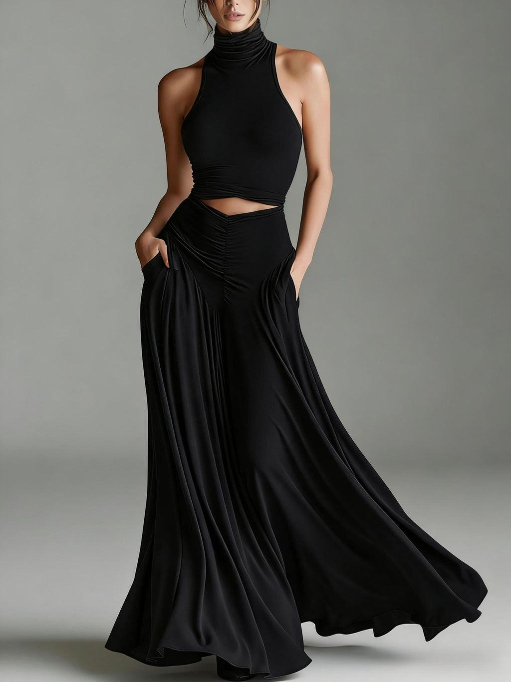 Black dress with cut-out design on a gray background