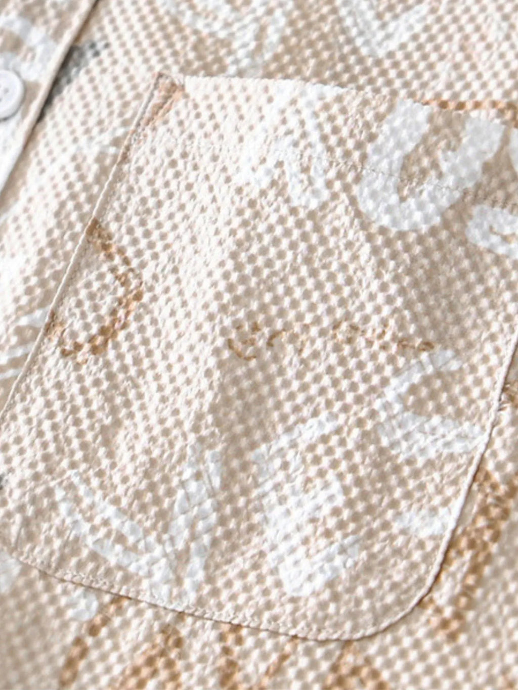 Close-up of a textured fabric with a pattern-blackorvani.com