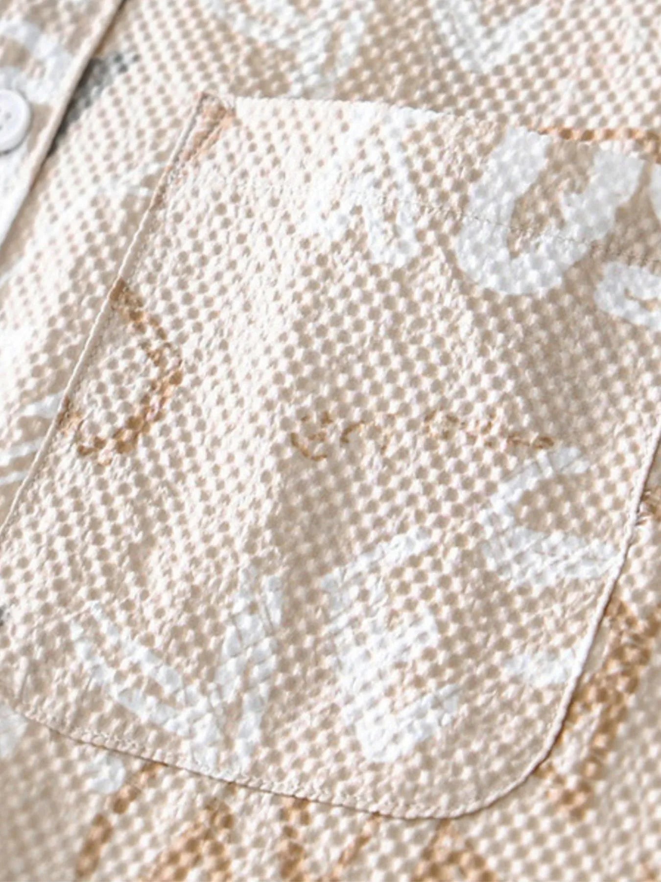 Close-up of a textured fabric with a pattern-blackorvani.com