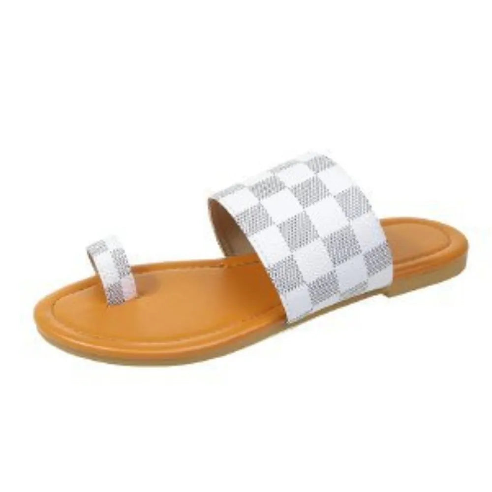 Checkered sandal with a white and gray pattern on a white background