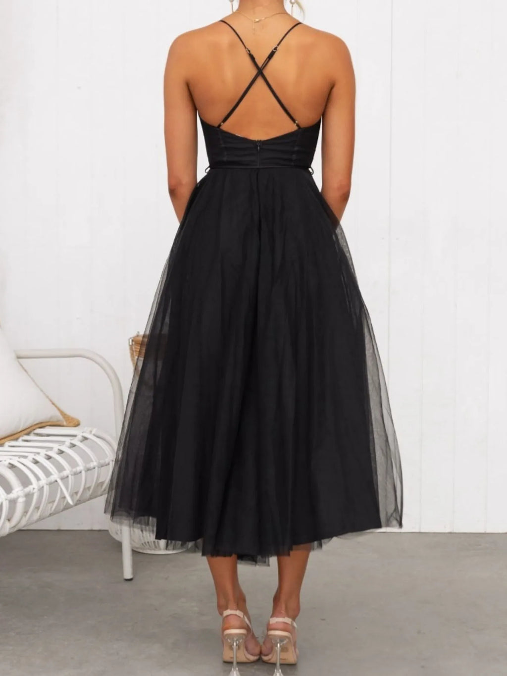 Black dress with criss-cross back design on a white background-blackorvani.com