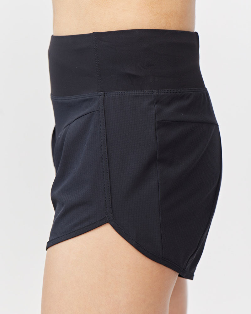 Black athletic shorts on a white background