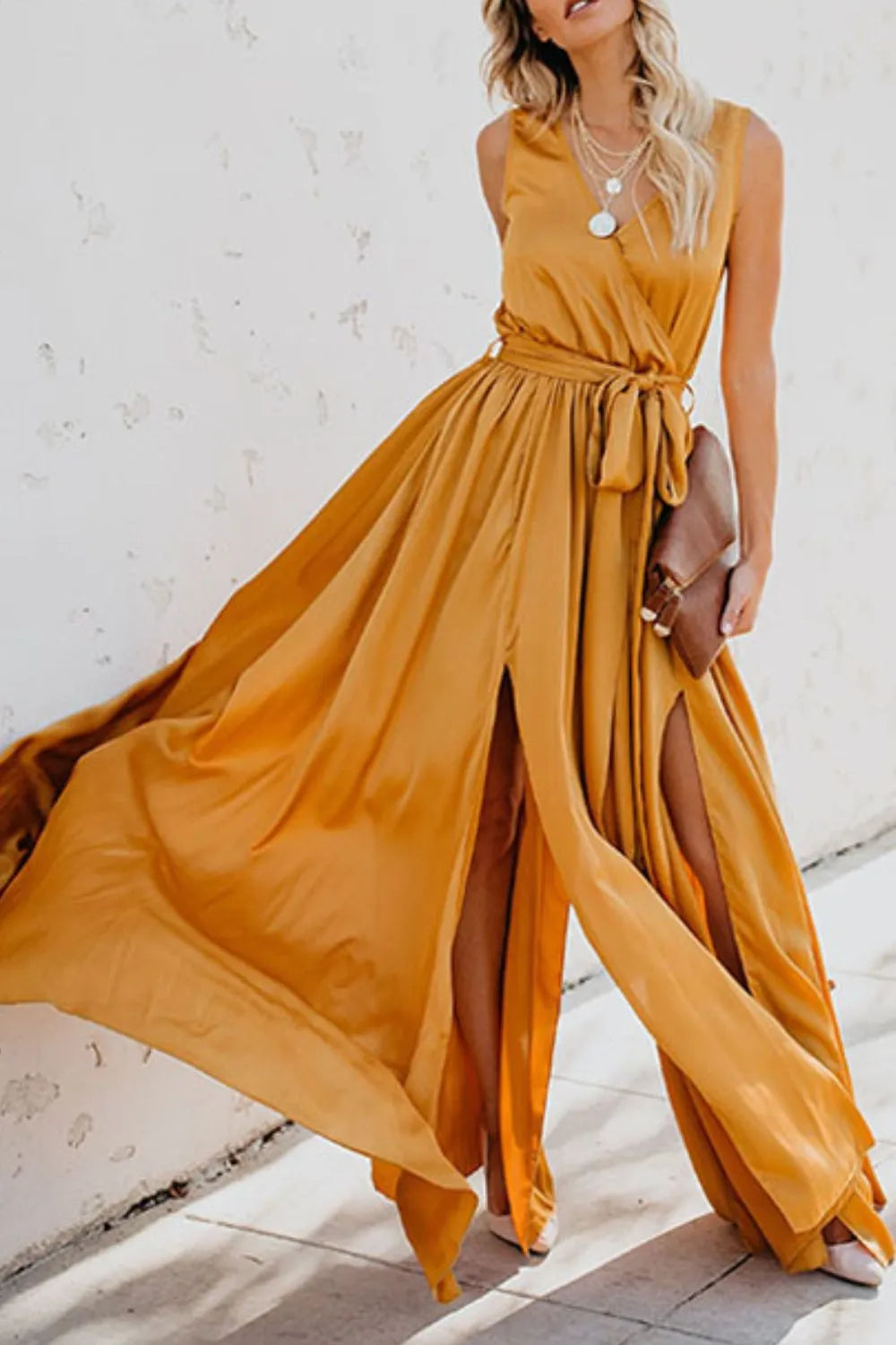 Woman wearing a mustard yellow dress with a white background-blackorvani.com