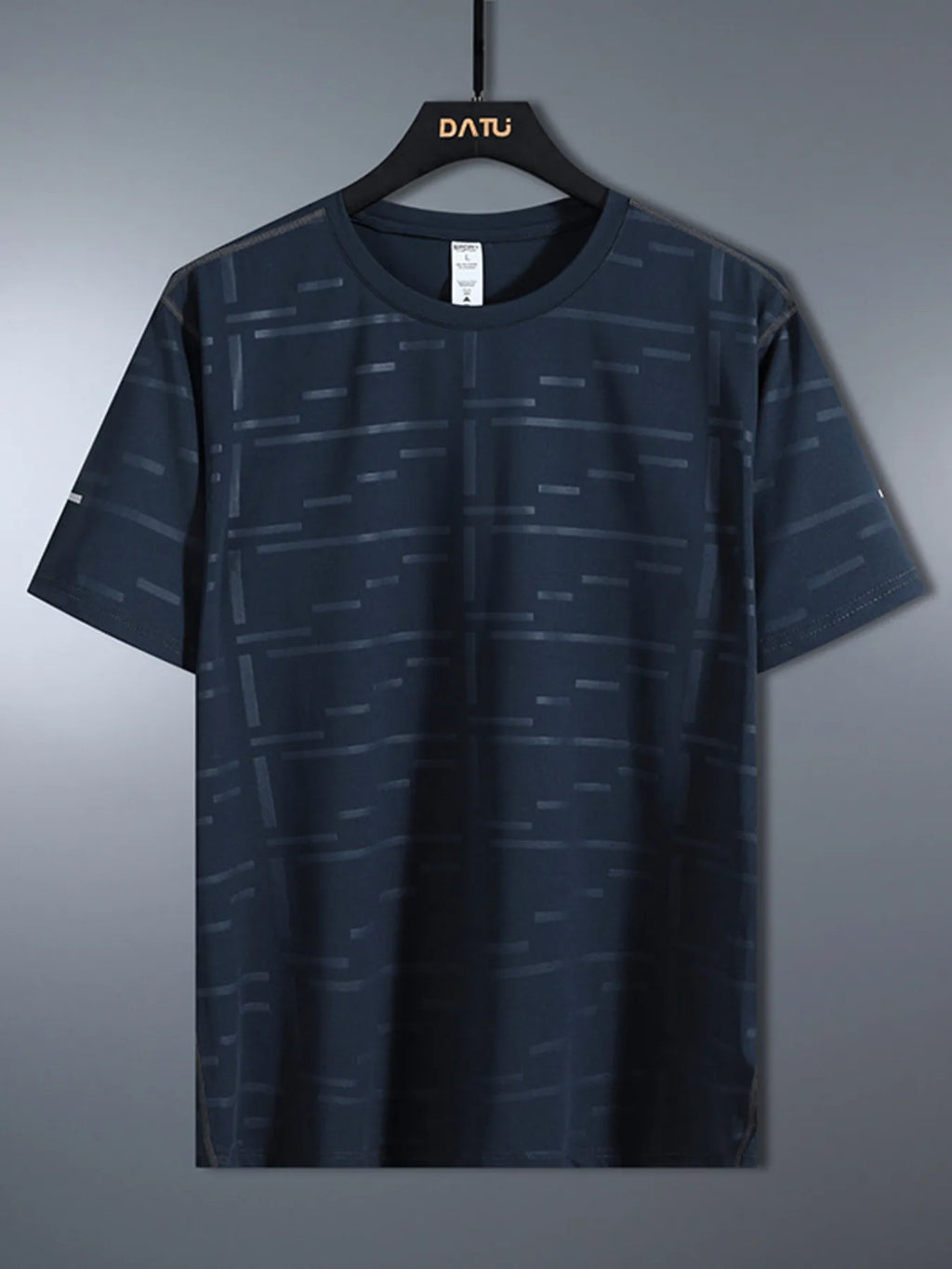 Navy blue t-shirt with subtle pattern on a hanger against a gray background-blackorvani.com