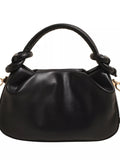 Black handbag with knotted handle on a white background-blackorvani