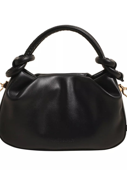 Black handbag with knotted handle on a white background-blackorvani