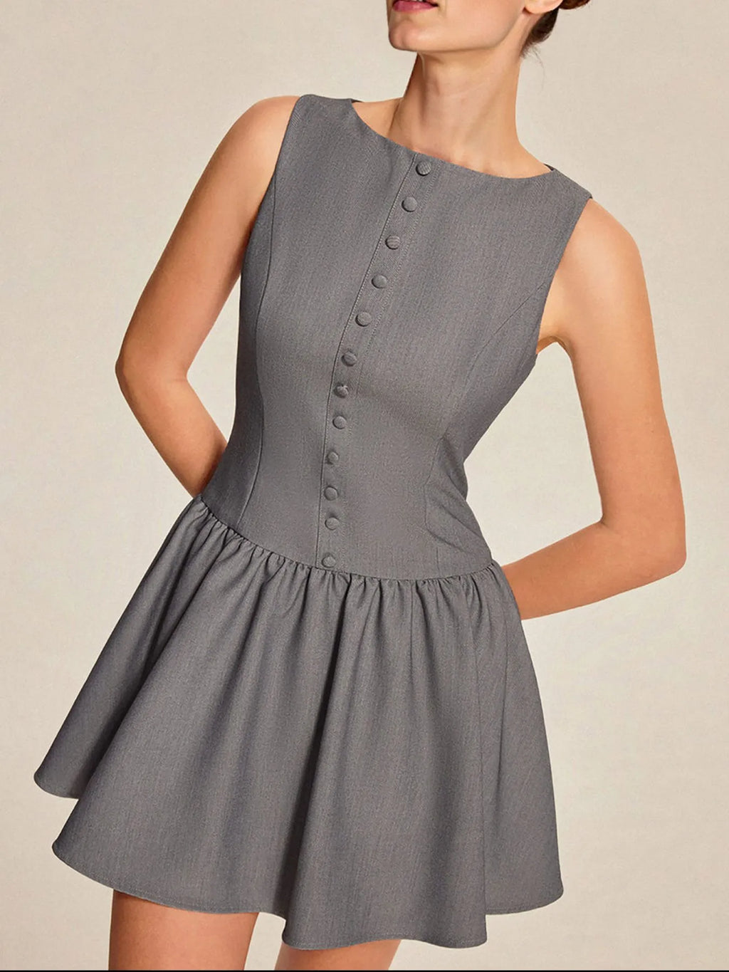 Gray dress with button details on a neutral background-BlackOrvani