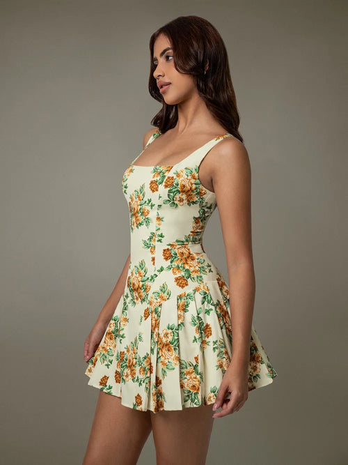 Woman wearing a floral dress against a neutral background-blackorvani