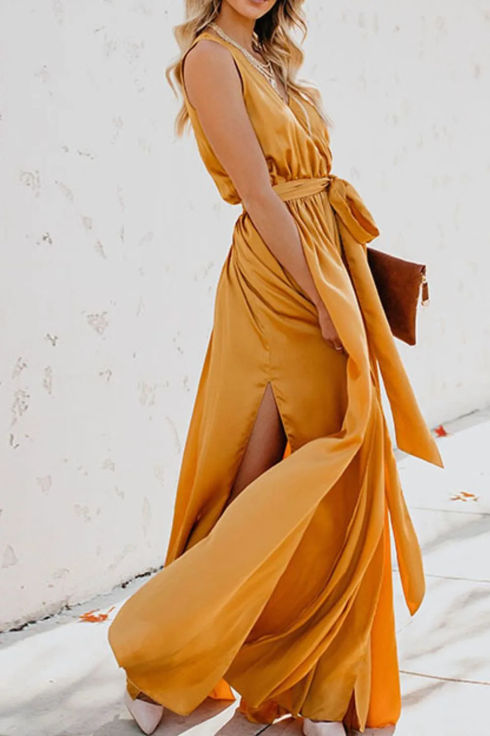 Woman wearing a mustard yellow dress with a white background-blackorvani.com