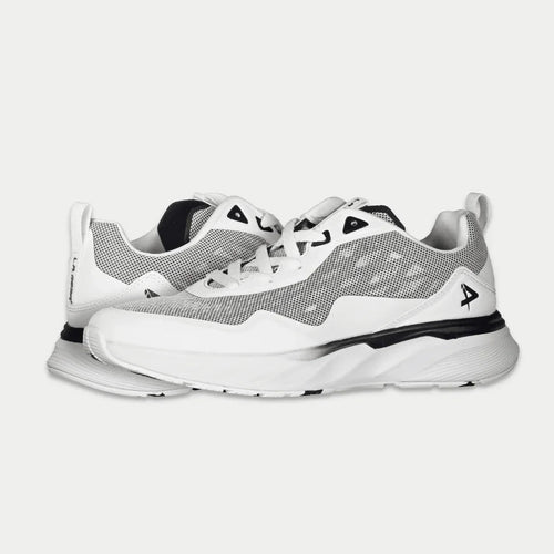 White and gray athletic shoes on a light gray background