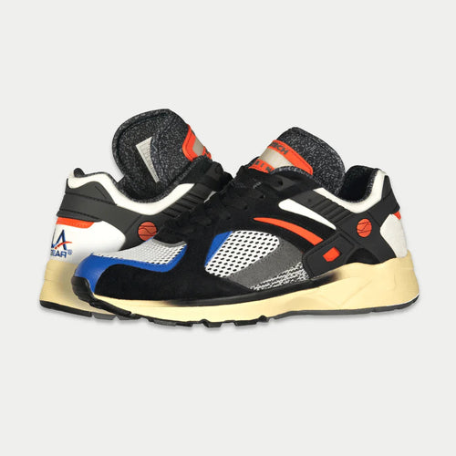 Colorful sneakers with a brand logo on a light gray background
