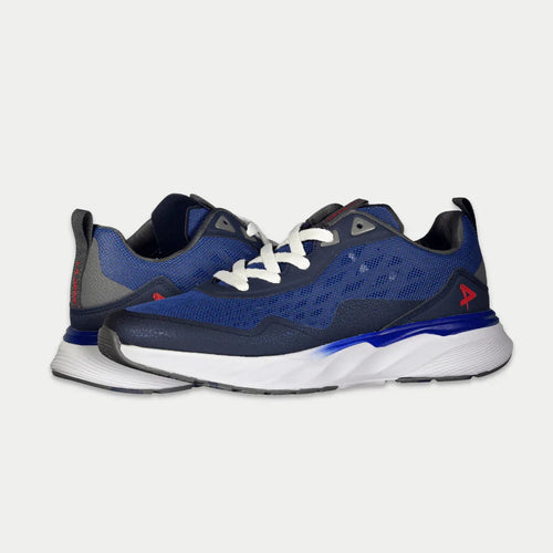 Blue running shoes with white soles on a light gray background